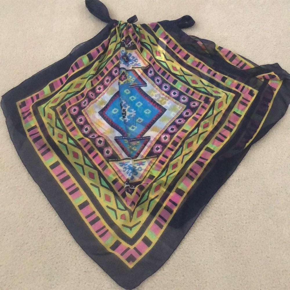 Lovely handkerchief style bathing suit cover up.